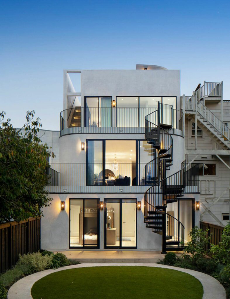 The exterior staircase connects the home's levels via the outdoor terraces.