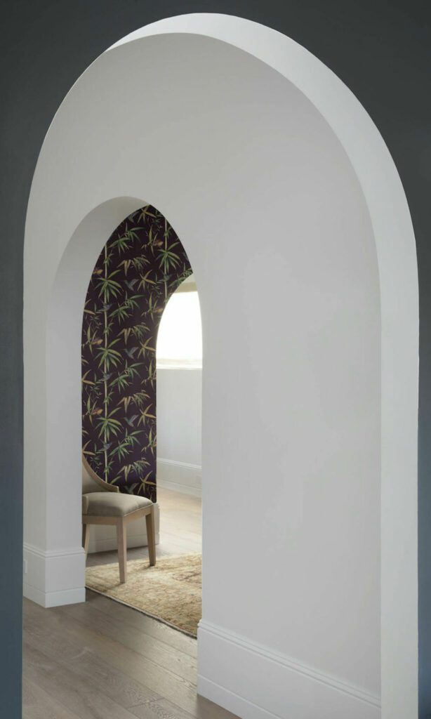 The arches lead the way throughout the home, creating a soft transition from room to room.