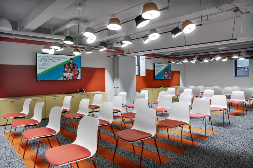 red and white seating in a training center room