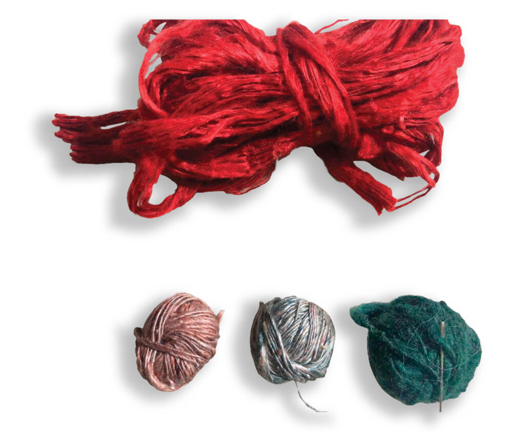 Handspun, naturally dyed silk yarns in red, pink, gray, and green