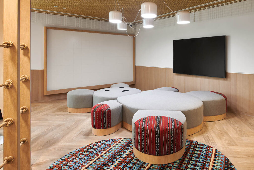 a nursery with a custom teddy bear ottoman