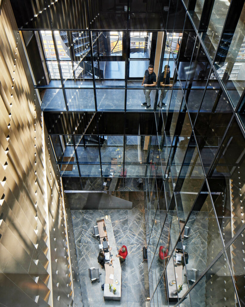 an aerial view of the check in area of a boutique hotel