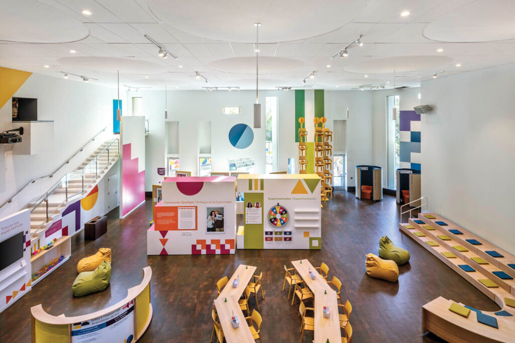 a children's room with colorful furniture and toys inside the Denver Art Museum