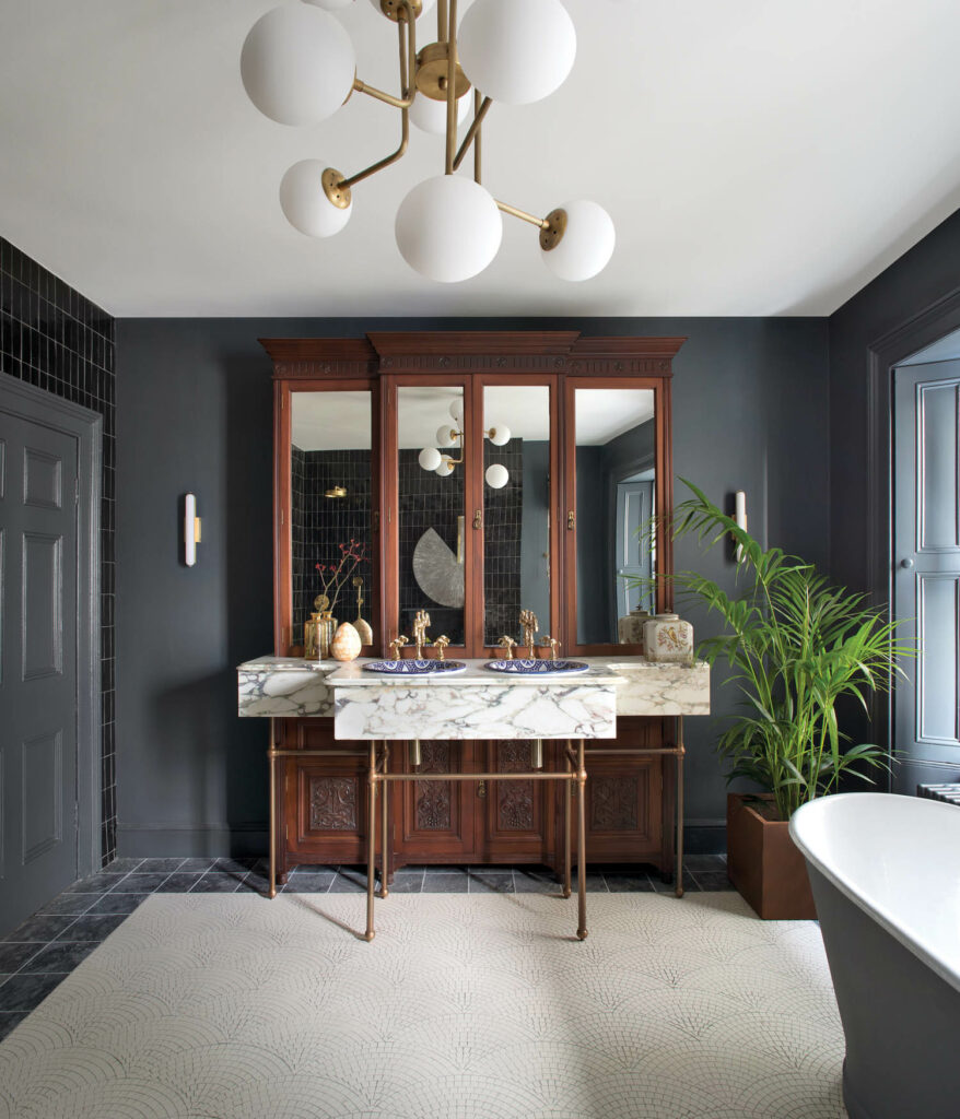 an antique armoire transformed into a vanity and medicine cabinet