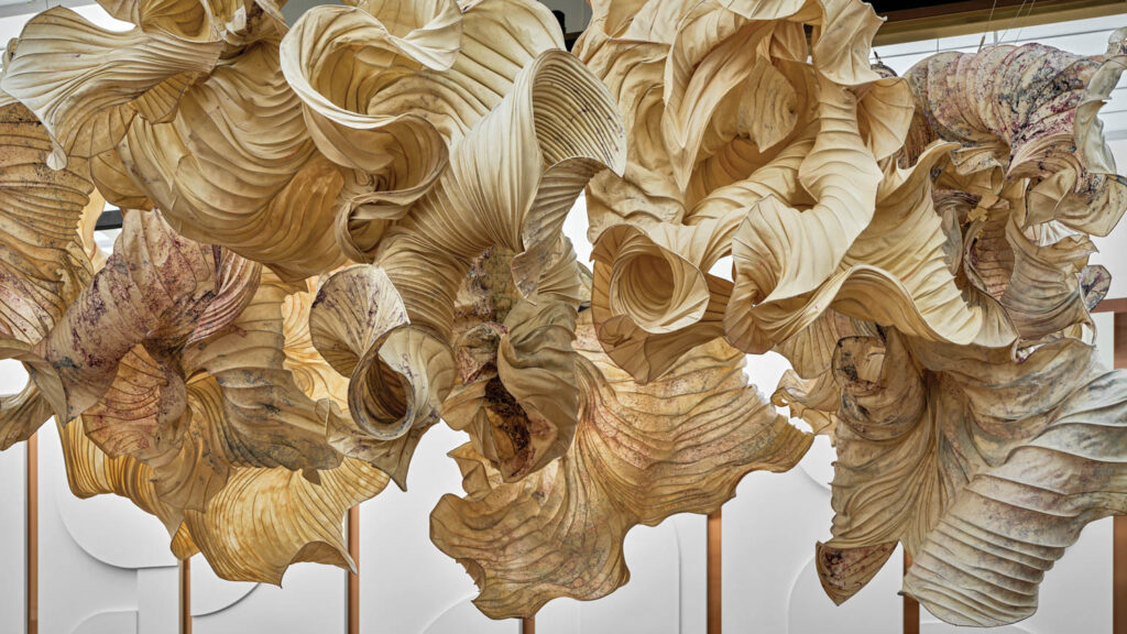 a billowing sculptural installation made of pulped paper at Restaurant Born in Singapore