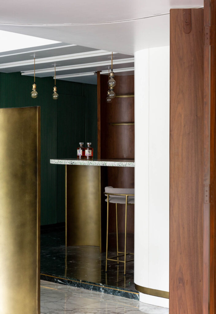 liquor bottles sit on the home bar in a Mumbai apartment