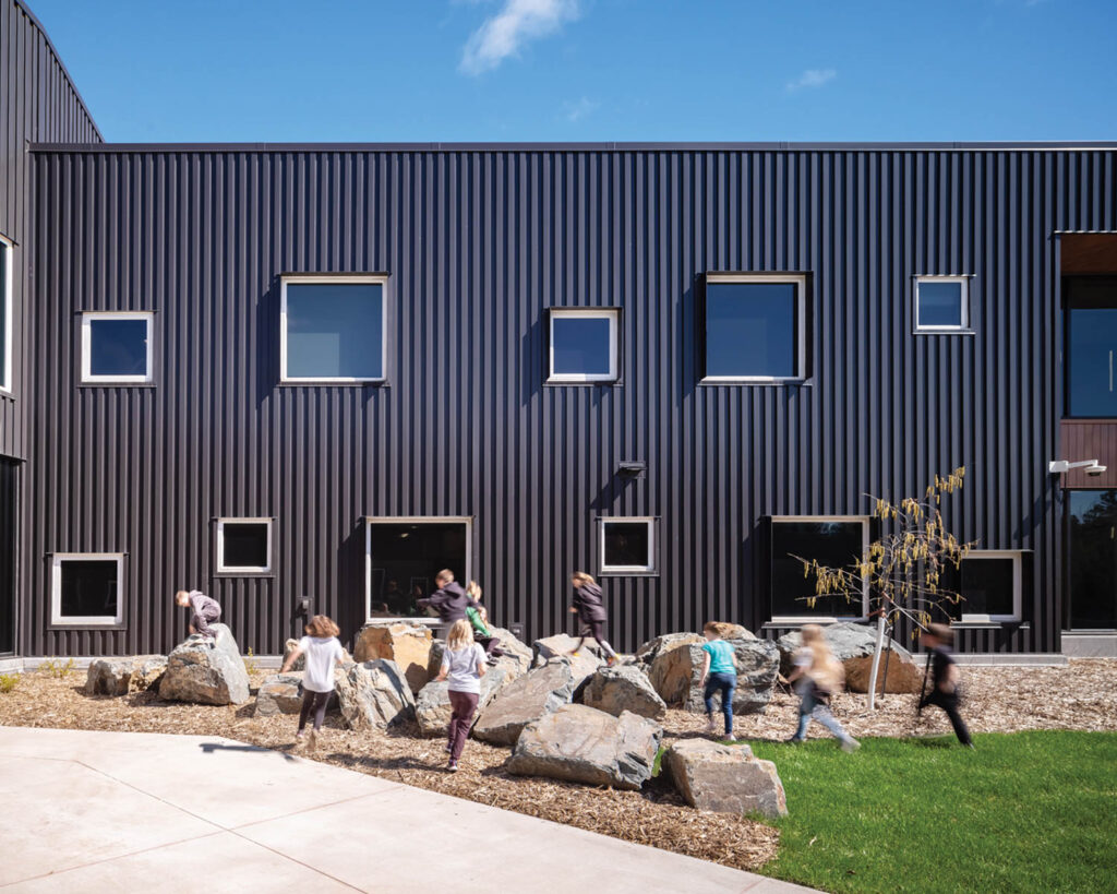 Gray exterior of Laurentian Elementary School in Eveleth, Minnesota,