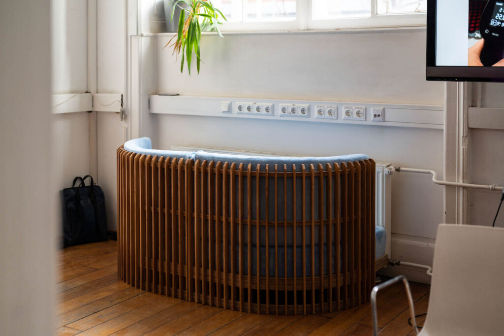 the back of a couch with a built in radiator
