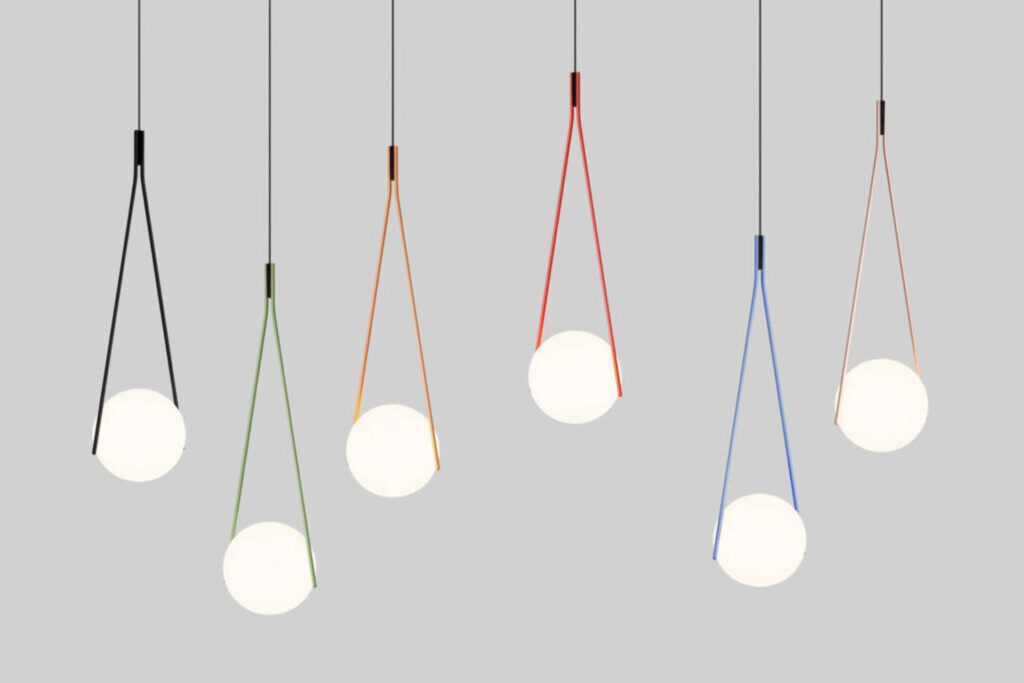 Hanging globes of light fixtures with multi-colored wires