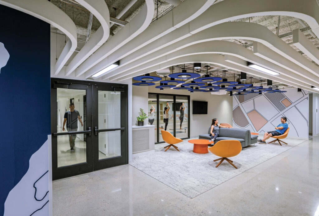 White beams snake around the ceiling in Santa Clara Towers