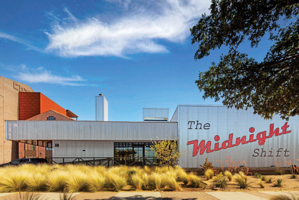 corrugated steel clads The Midnight Shift restaurant and music venue at the Cotton Court Hotel