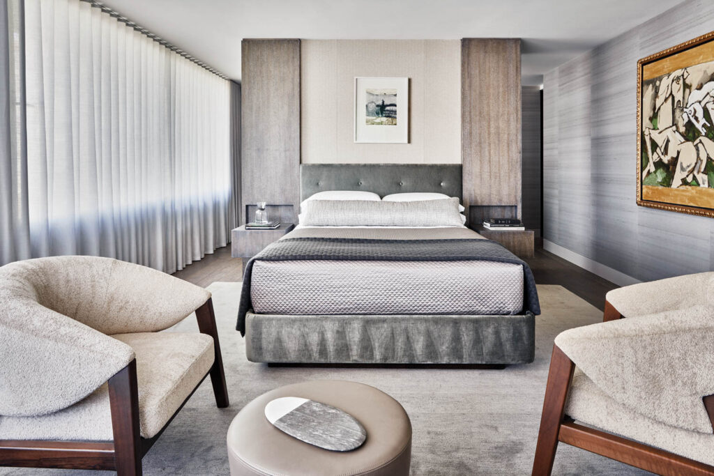 a bedroom of neutrals inside a California home 