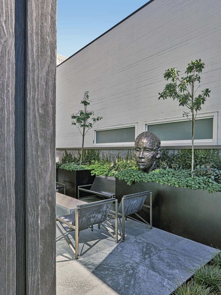 a Lionel Smit sculpture on the terrace of a San Francisco home