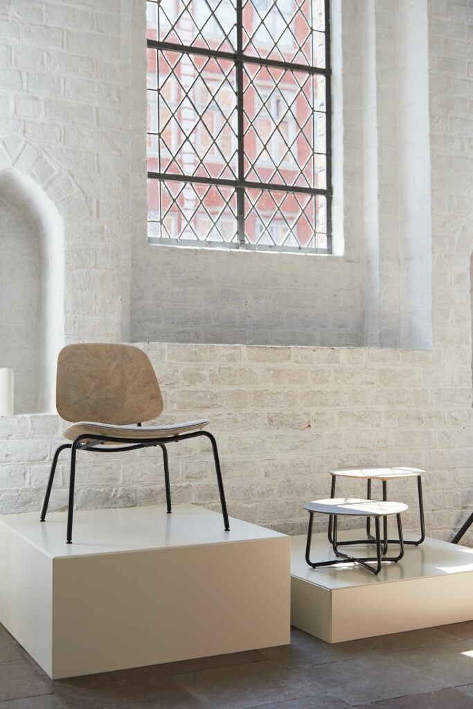 Lily tables and the Compound lounge chair by OEO Studio for Mater