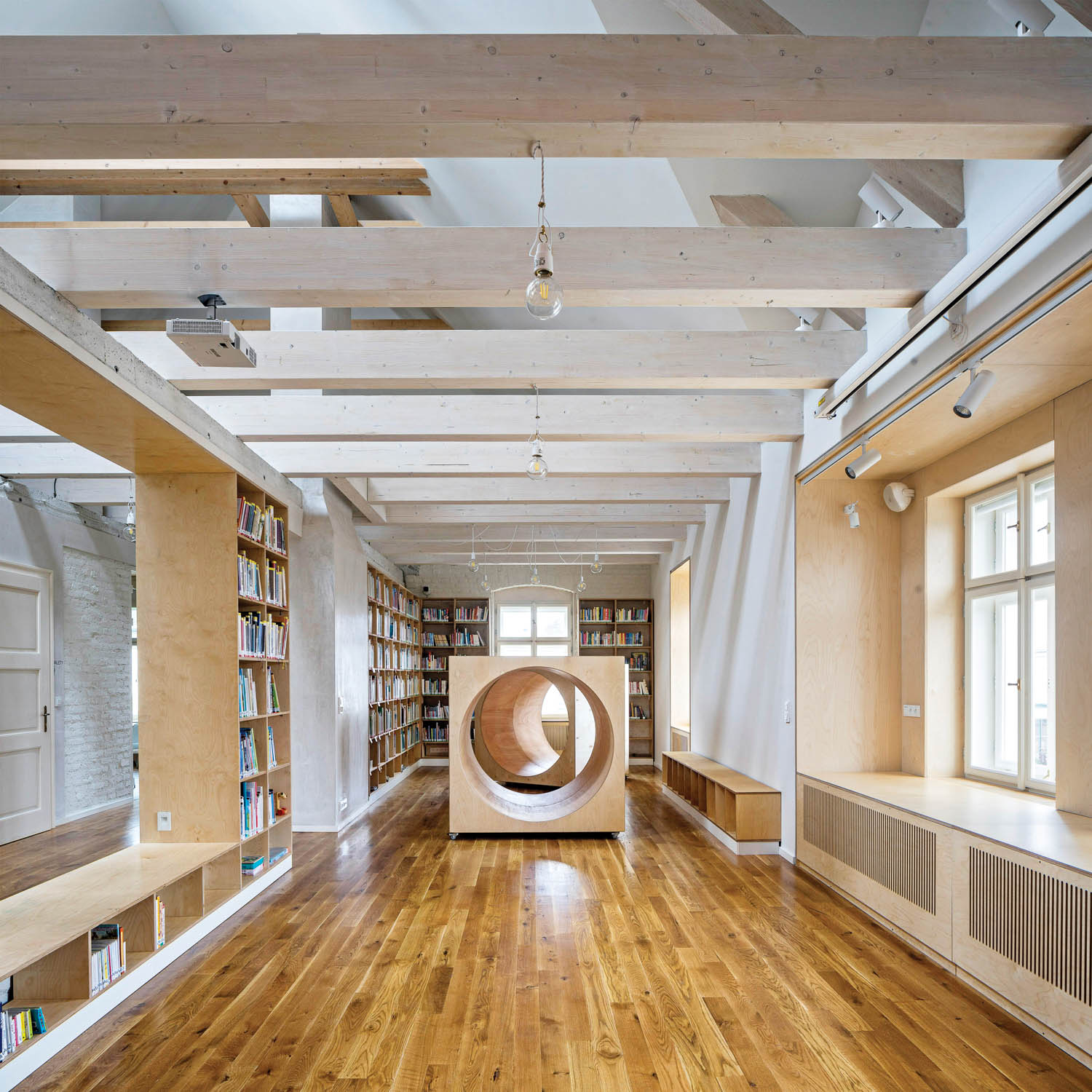 round cubbies for children to sit in while reading inside a library