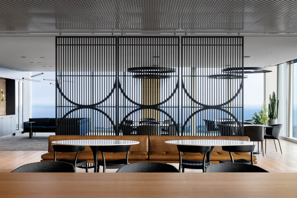 moveable iron screens in front of a seating area in Boston Consulting Group's headquarters