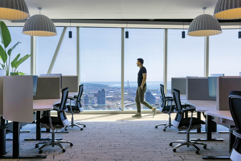 felt pendants hang above desks in an office area