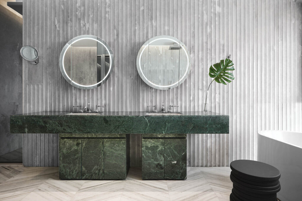 a green Brutalist style vanity in a bathroom