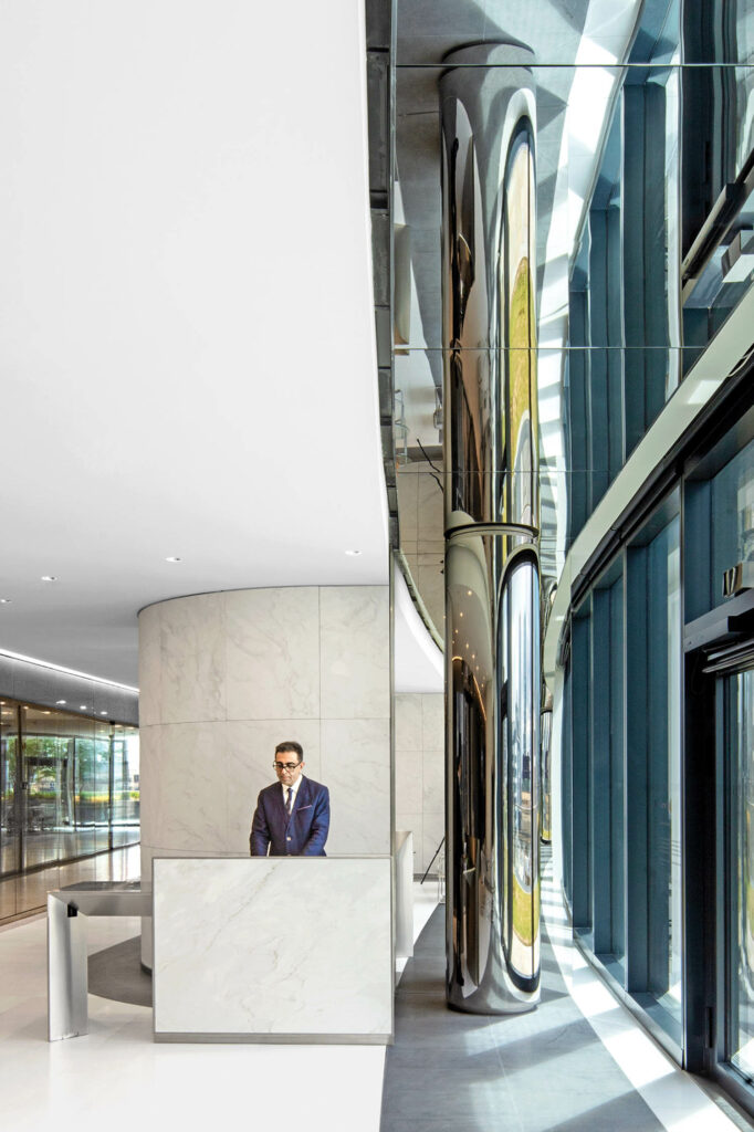 a stainless steel-clad column inside Milbank