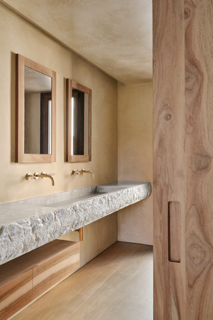 a granite countertop forms the vanity in this bathroom