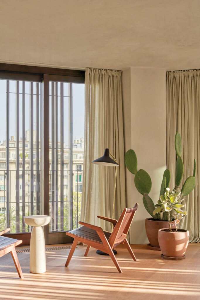 the living room nook of an organically decorated penthouse