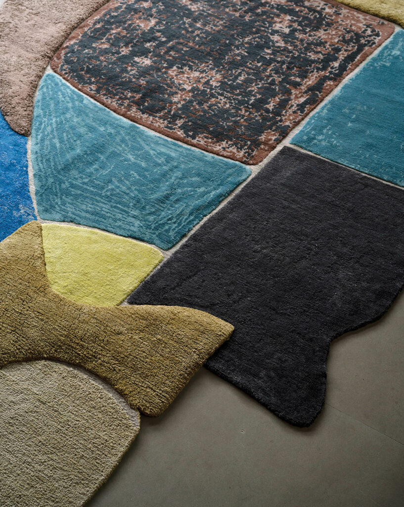 the Luz rug in various colors and amorphous shapes