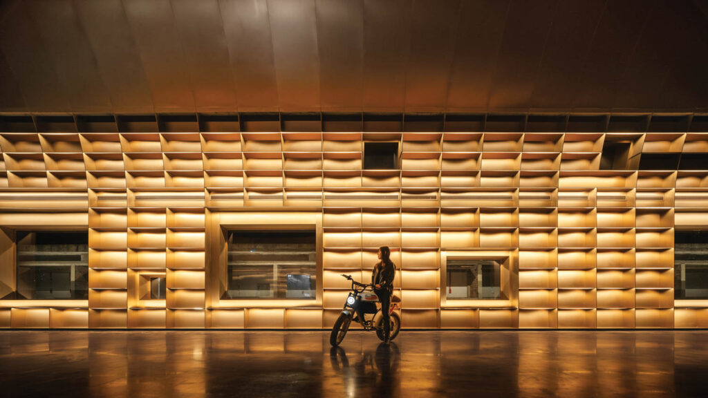 floor to ceiling shelves lit by LEDs