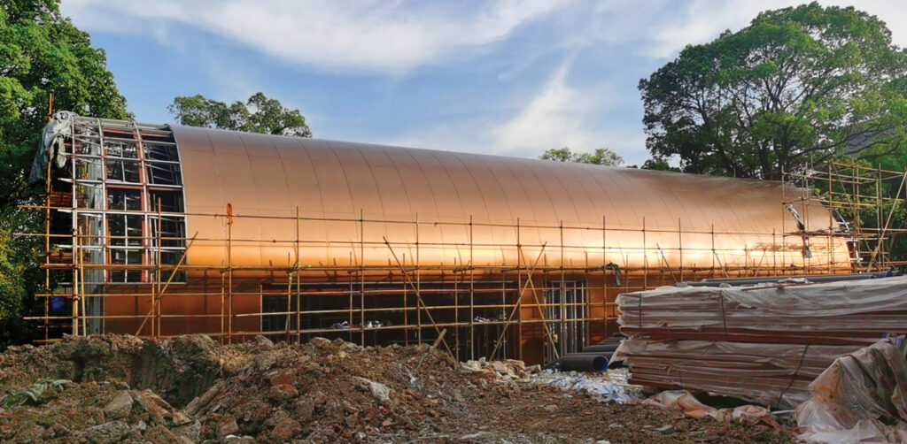 copper plates covering the steel frame of a structure