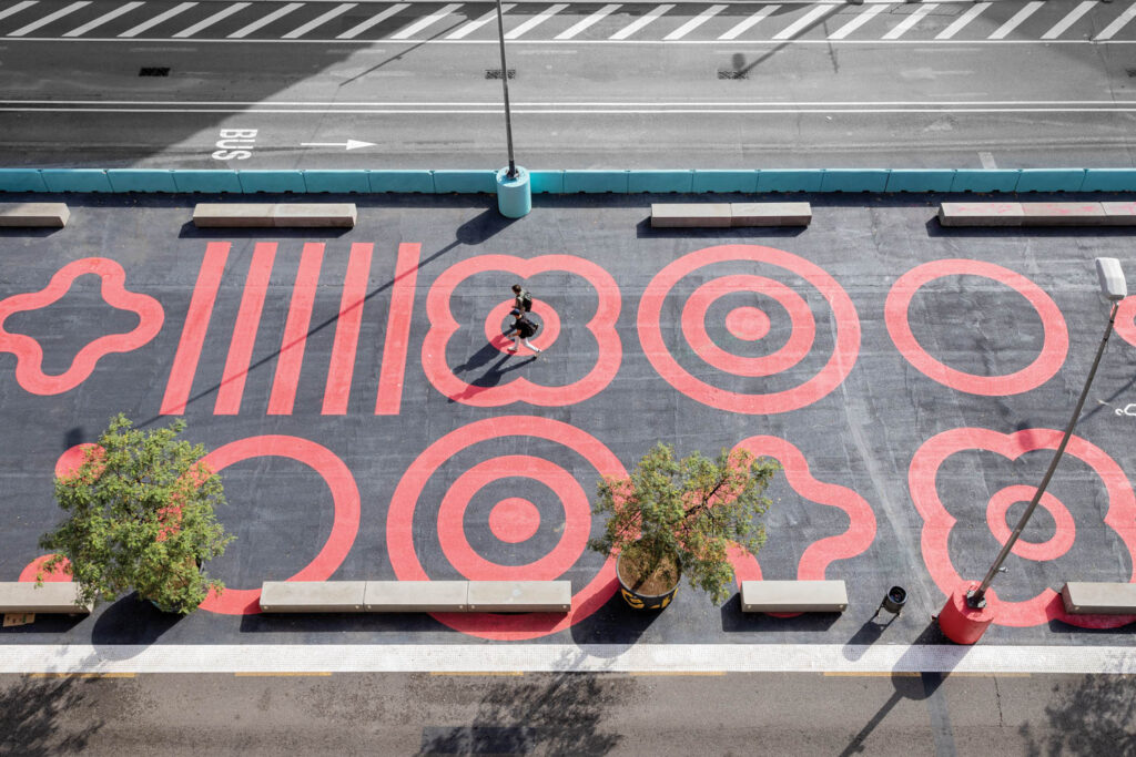 Barcelona flowers on cement tiles of pedestrian areas