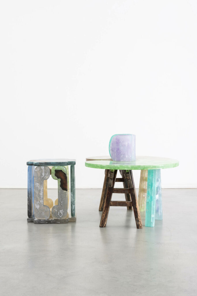 A colorful table with a cutout for a stool