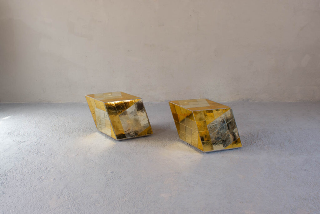 two gold cubes that double as stools