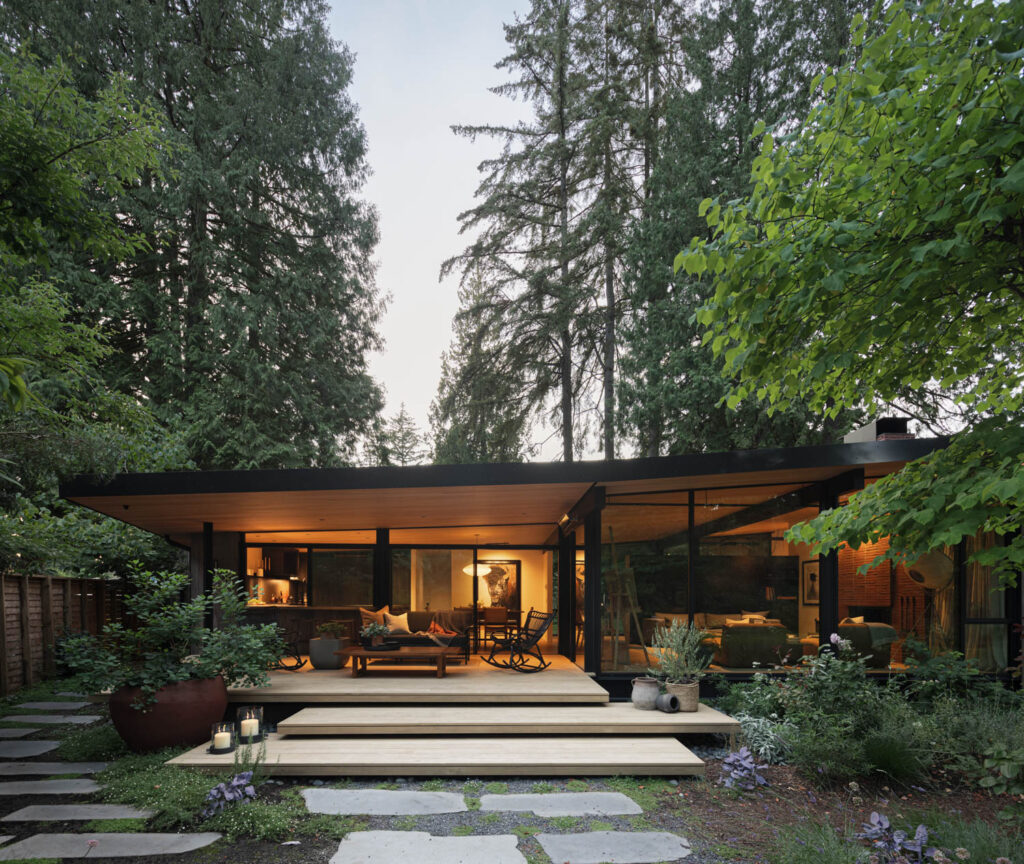 a mid-century home surrounded by nature