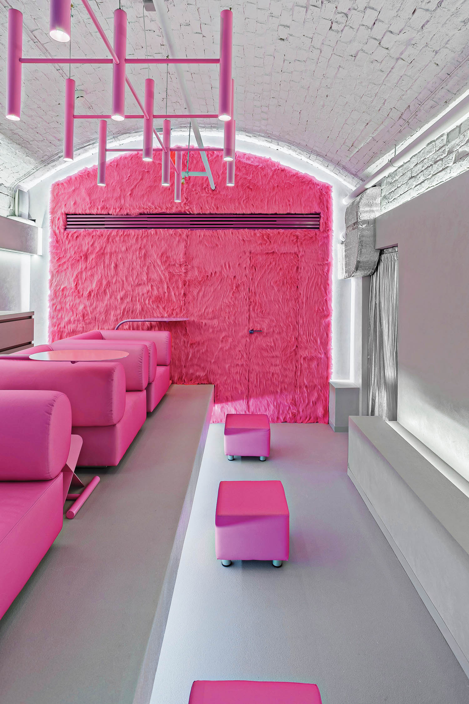 Hot pink booths in G. Bar Brave