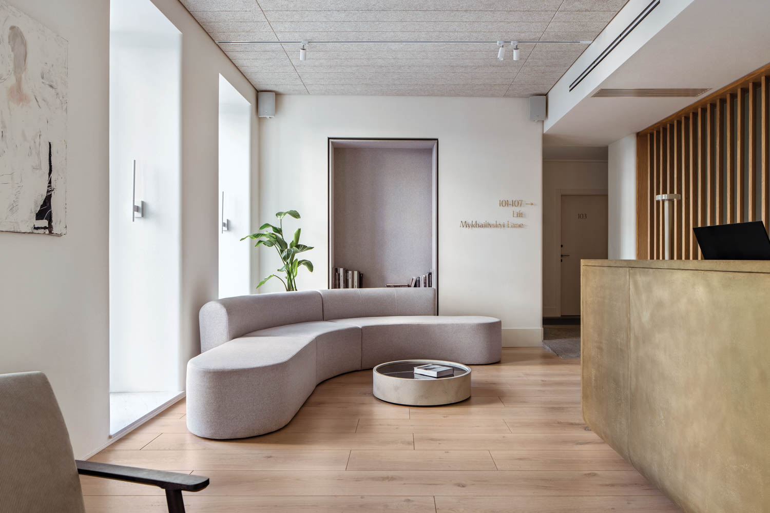 a curving sofa in the lobby of the Sophia Hotel in Kyiv