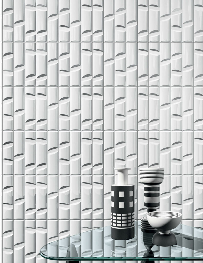 Storagemilano’s Volume white-body porous single-fired wall tiles in extra-glossy finish by Ceramica Bardelli.