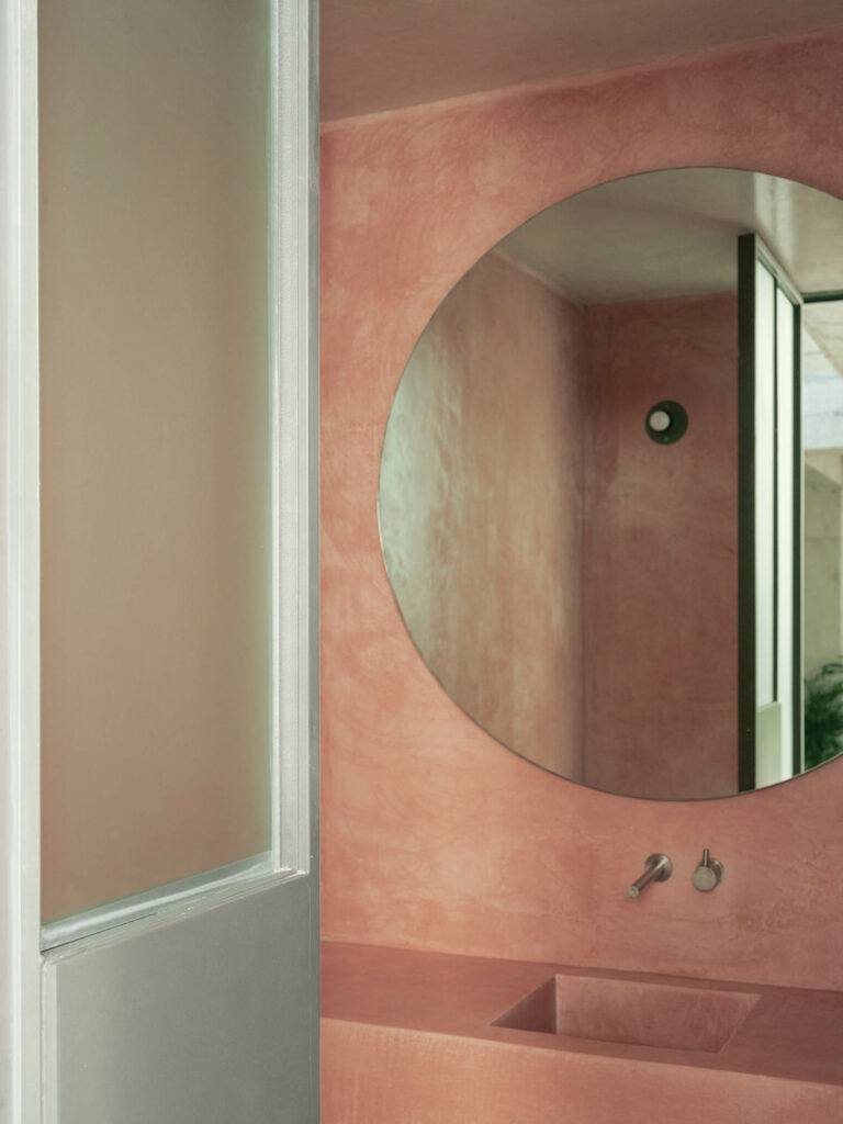 a powder room in clay pink shades