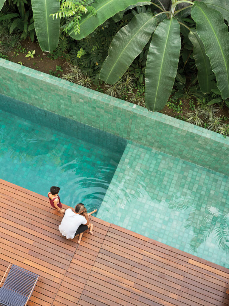 ceramic tiles line a lap pool