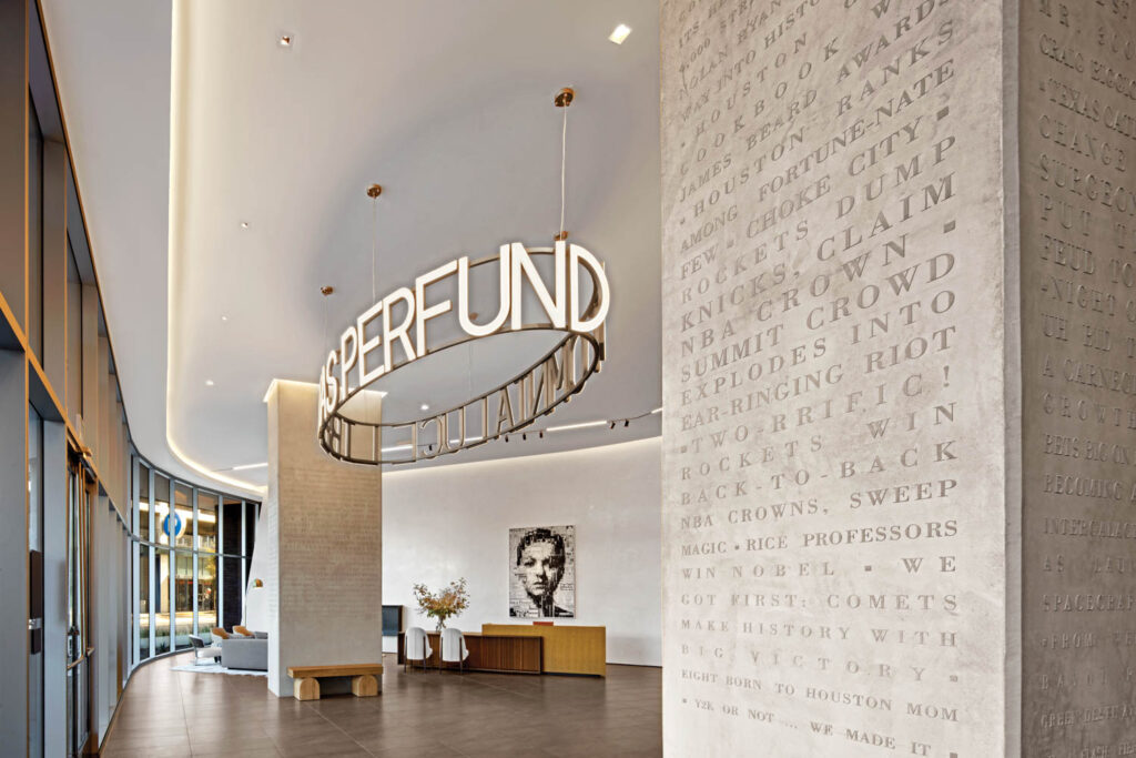 historic Chronicle headlines were stenciled onto the concrete structural columns of the lobby