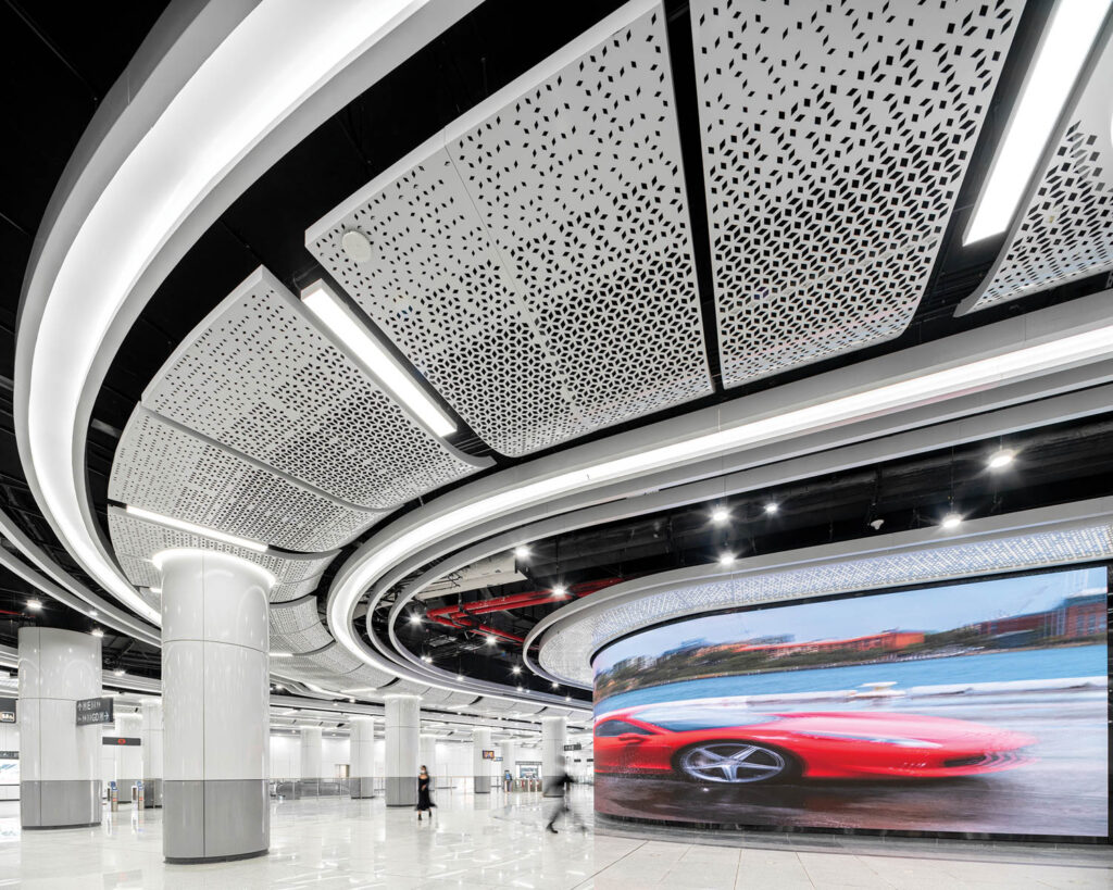 the metro line ceiling curves around the space