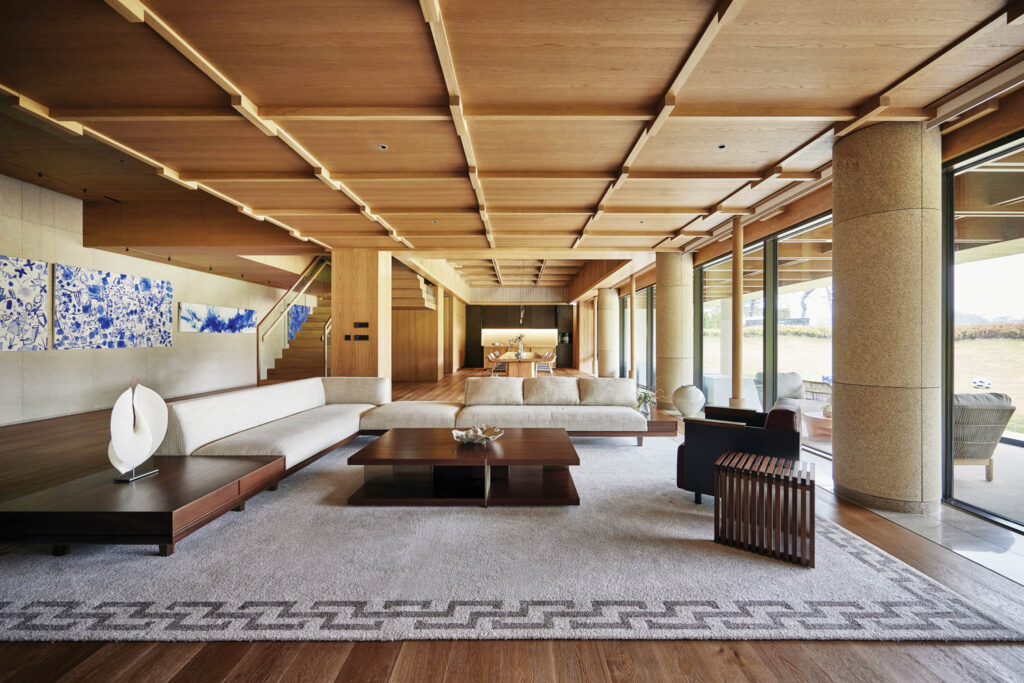 the common area includes earth-toned furnishings