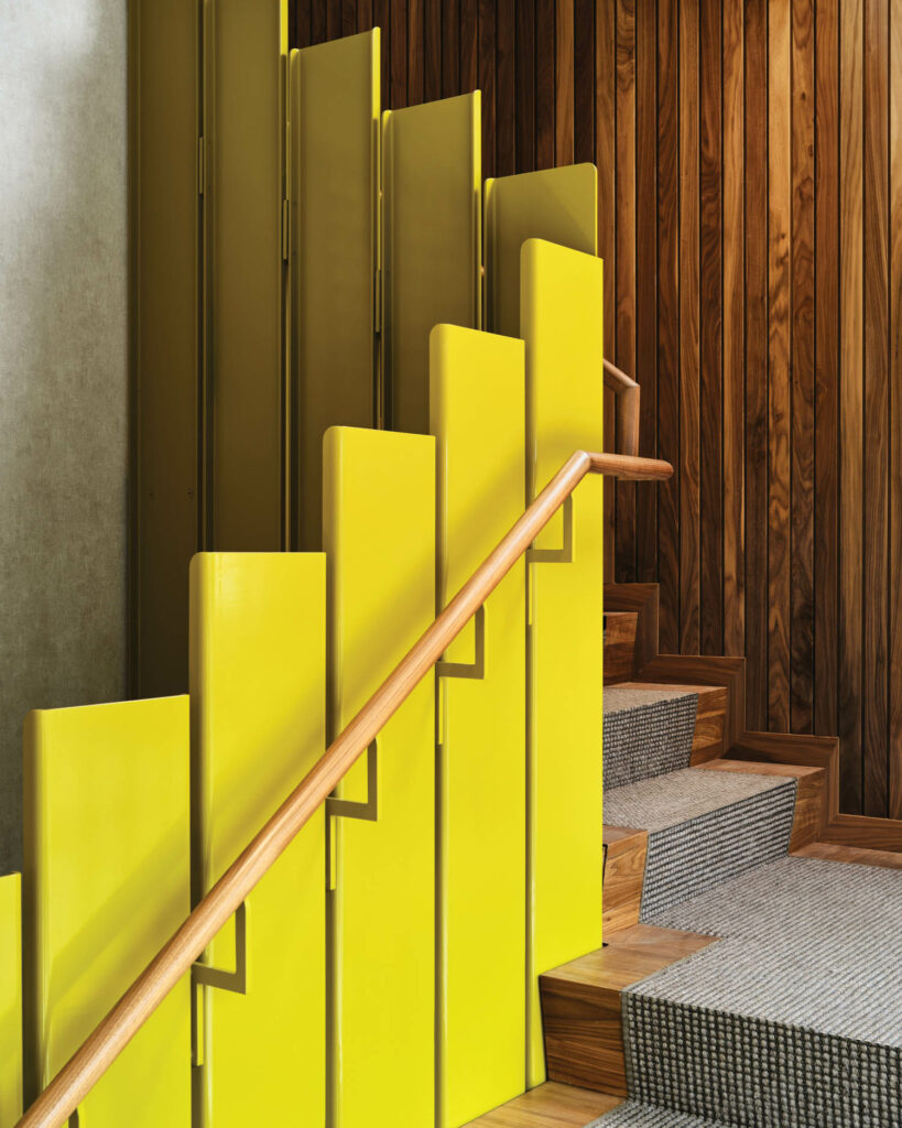 staircase entry with yellow boards