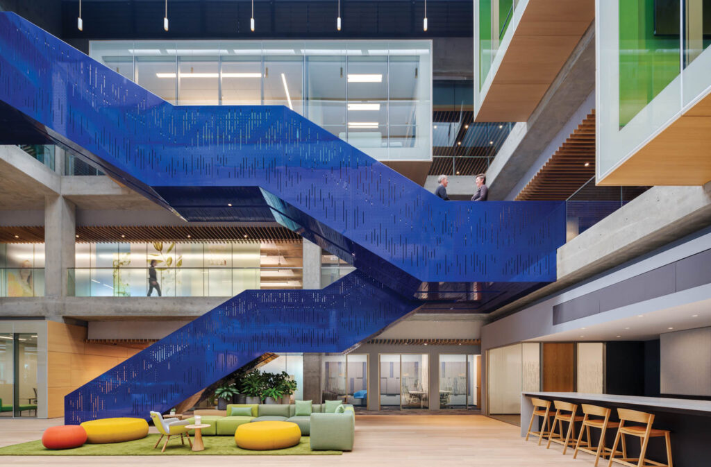 Interior lobby looking at dark blue stairs