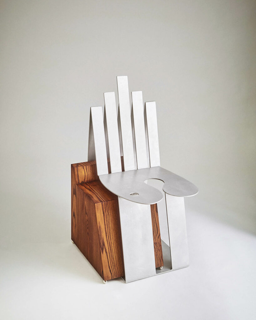 grey nested chair on a wooden platform