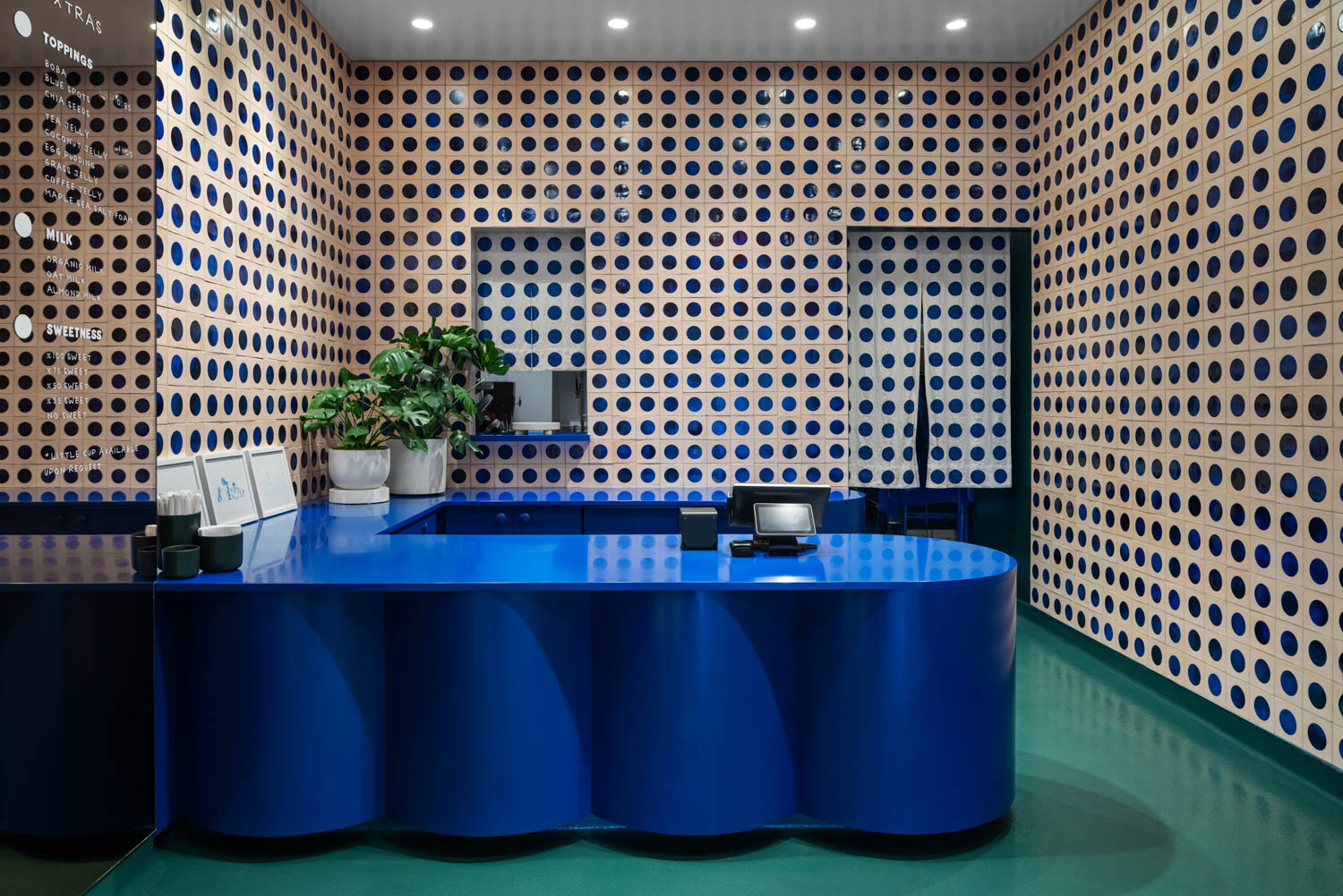 bright blue counter area of Jellyman tea shop