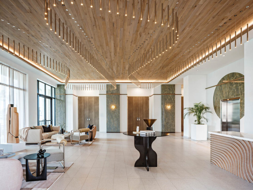 hotel lobby with wooden ceiling, bright lights and lots of space