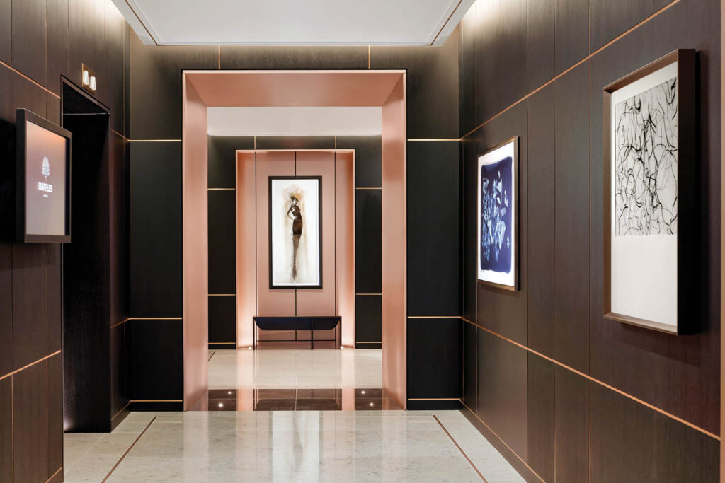 long hallway with black painted walls