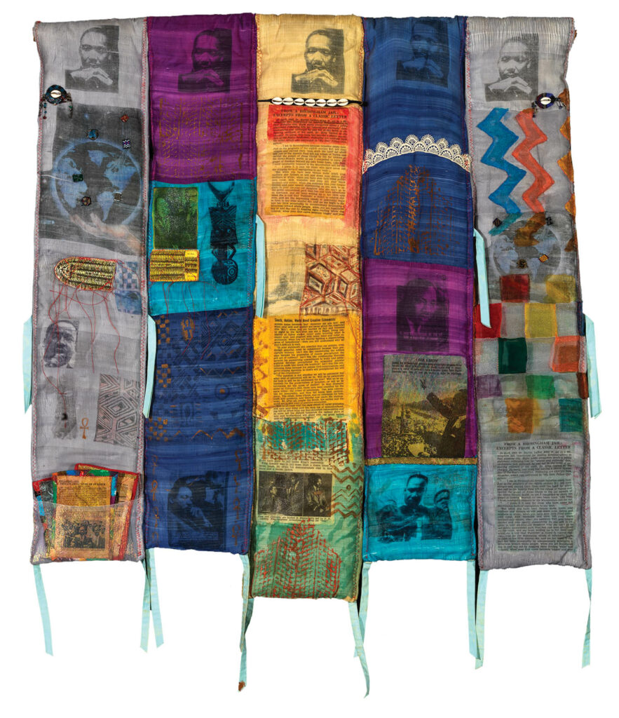 multicolored quilt with newspaper images from MLK's talks