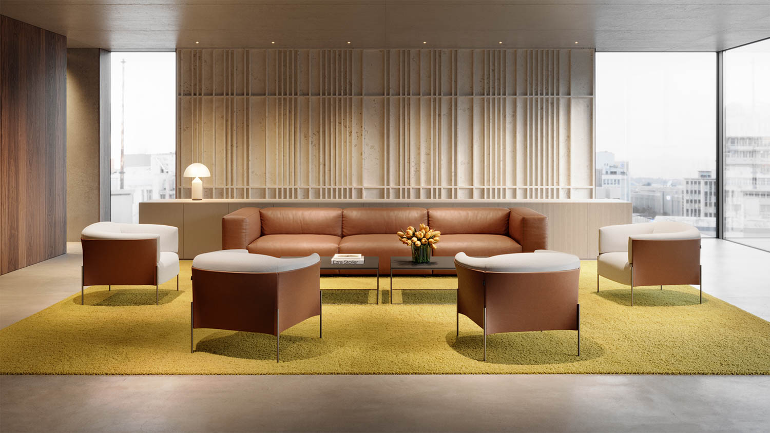 living room with tan couch and armchairs and yellow shag carpet