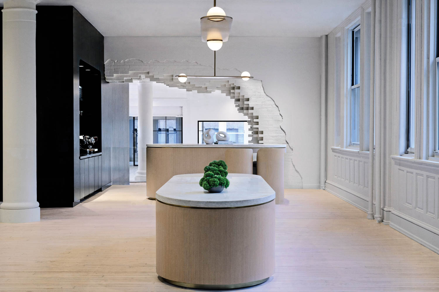 reception area with black cabinet and white-oak cabinets