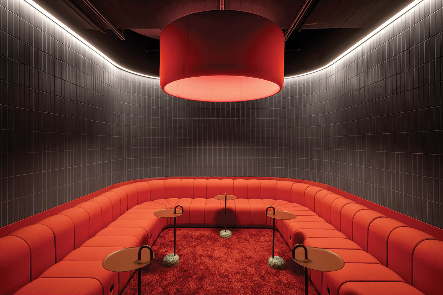 all red lounge area with ambient lighting